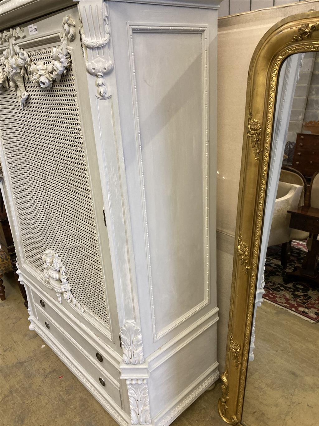 An early 20th century French painted and caned armoire, width 128cm depth 60cm height 192cm